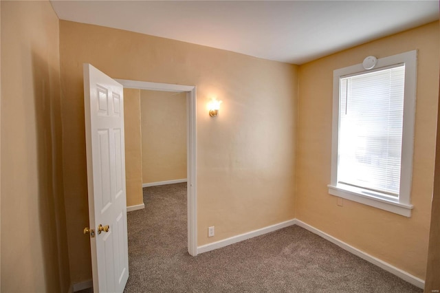 spare room with carpet flooring