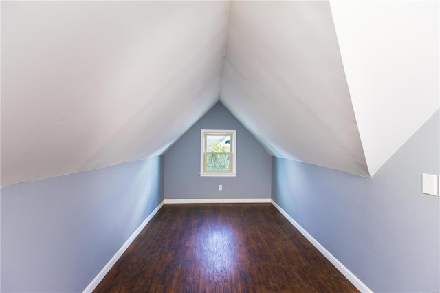 bonus room featuring vaulted ceiling and hardwood / wood-style floors