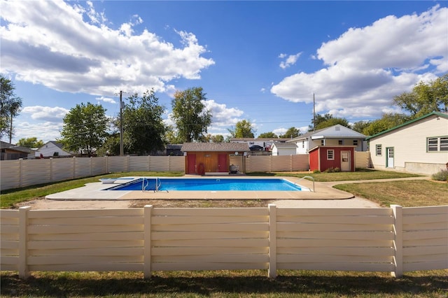 view of pool featuring a shed