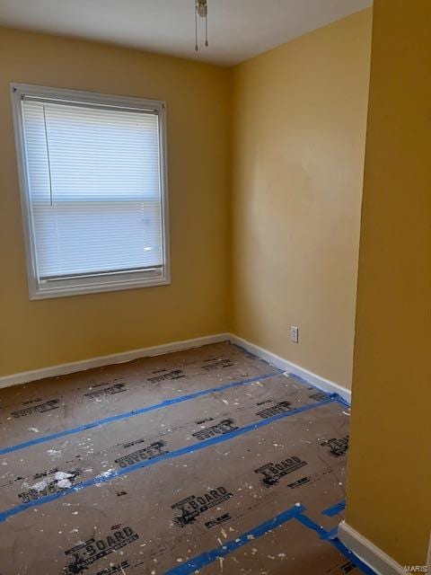 unfurnished room featuring ceiling fan