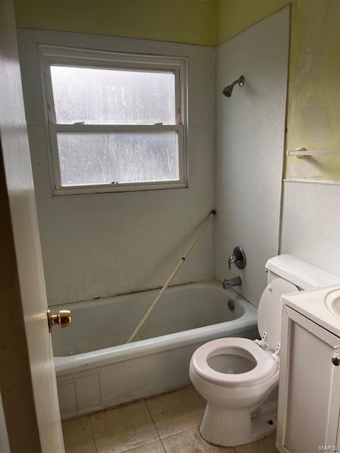 full bathroom featuring tile patterned flooring, vanity, toilet, and shower / washtub combination