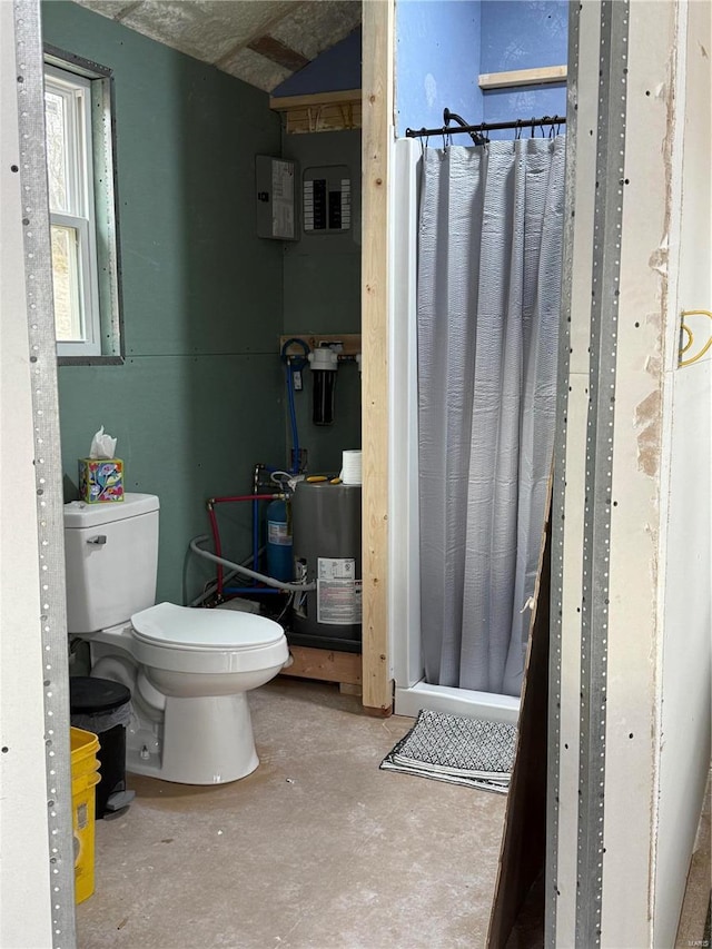 bathroom featuring toilet and concrete floors