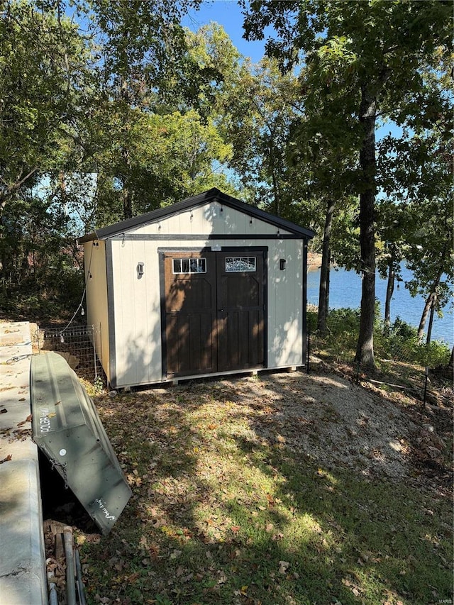 view of outdoor structure with a water view