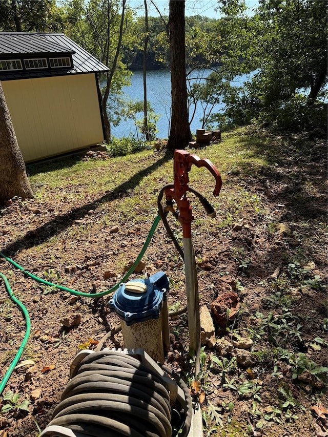 view of yard with a water view