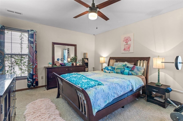 carpeted bedroom with ceiling fan