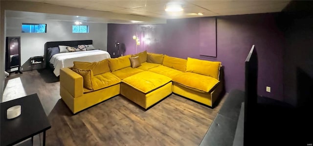 bedroom with dark wood-type flooring