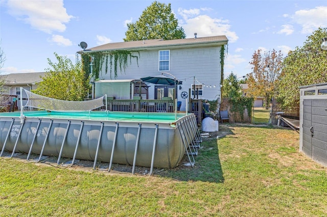 rear view of house with a yard