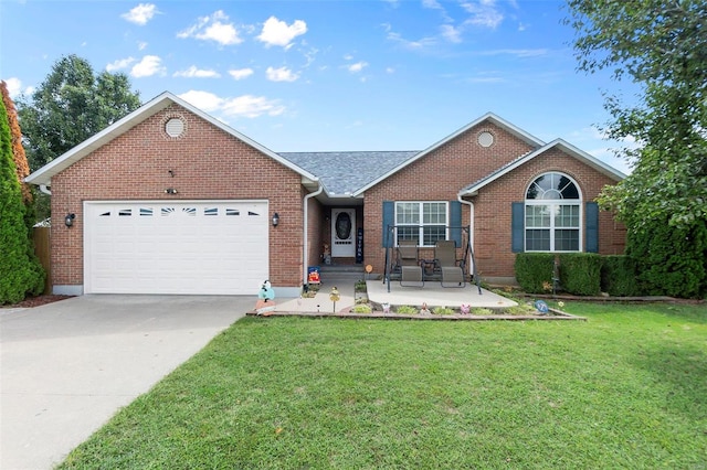 ranch-style house featuring a garage and a front lawn