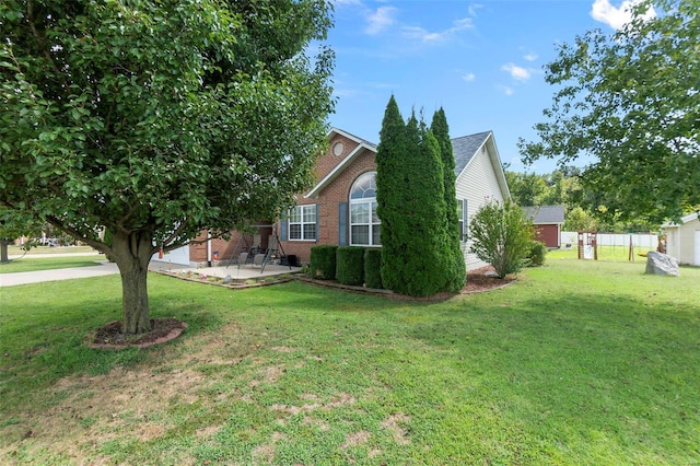 exterior space featuring a patio and a front yard