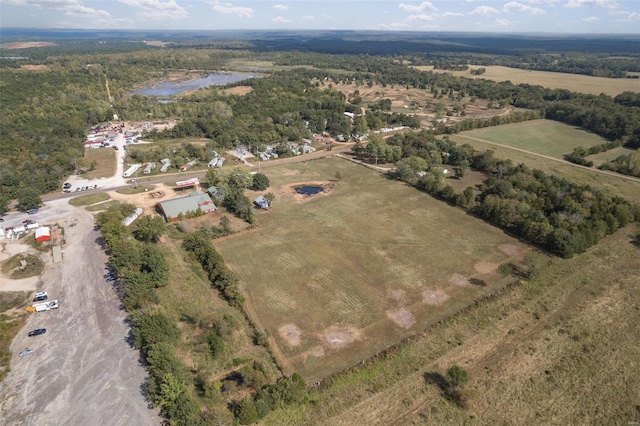 aerial view featuring a rural view and a water view