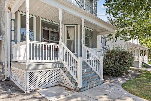 doorway to property with a porch