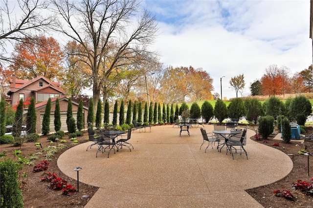 surrounding community featuring a patio area