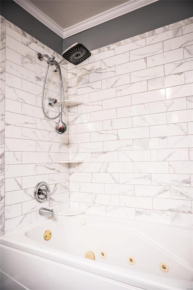 bathroom featuring ornamental molding and tiled shower / bath combo