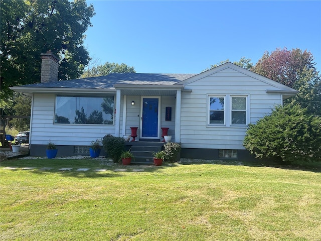 single story home featuring a front yard