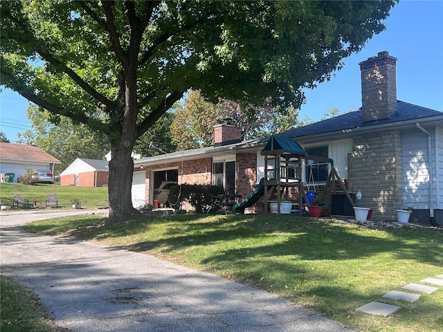 view of front of home with a front yard