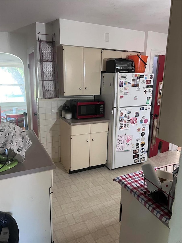 kitchen featuring white refrigerator