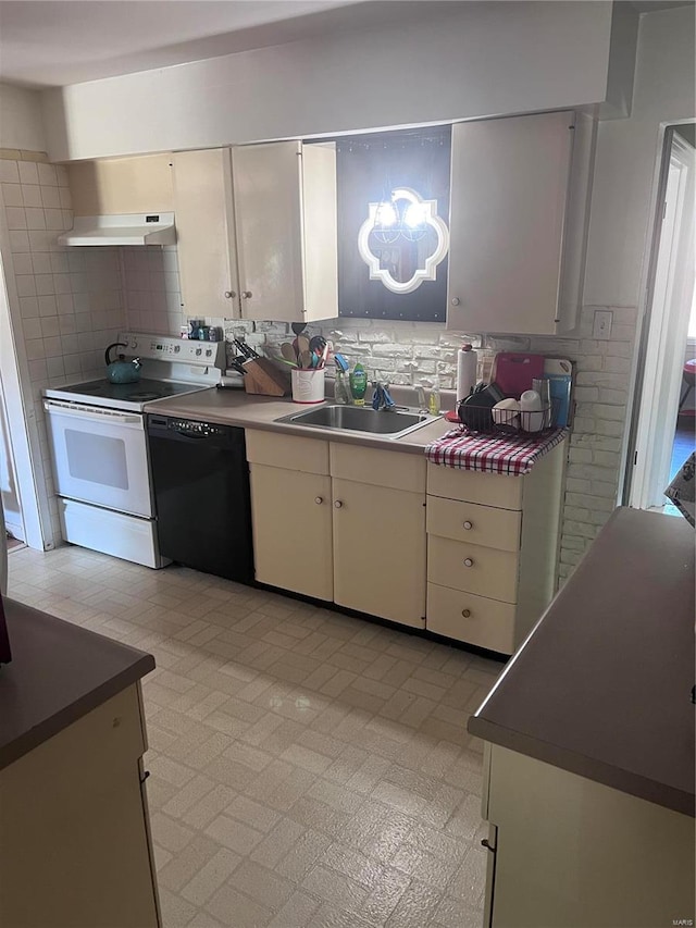 kitchen with black dishwasher, backsplash, sink, and white range with electric stovetop