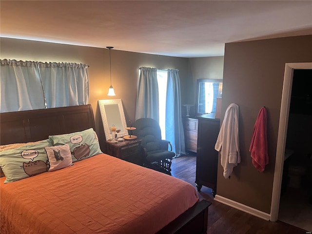 bedroom featuring dark hardwood / wood-style floors