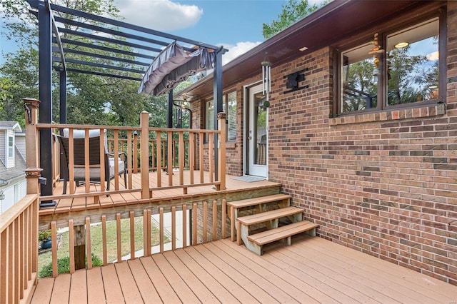 wooden deck with a pergola