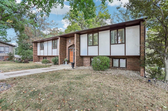 split foyer home with a front yard