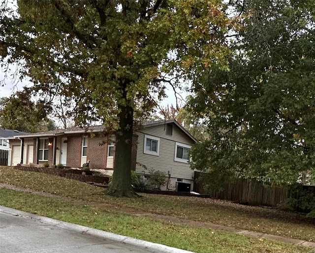 view of home's exterior with a yard