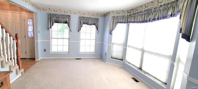 spare room with carpet floors