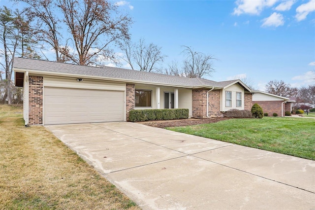 ranch-style house with a front lawn and a garage