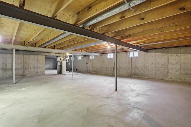 basement featuring gas water heater