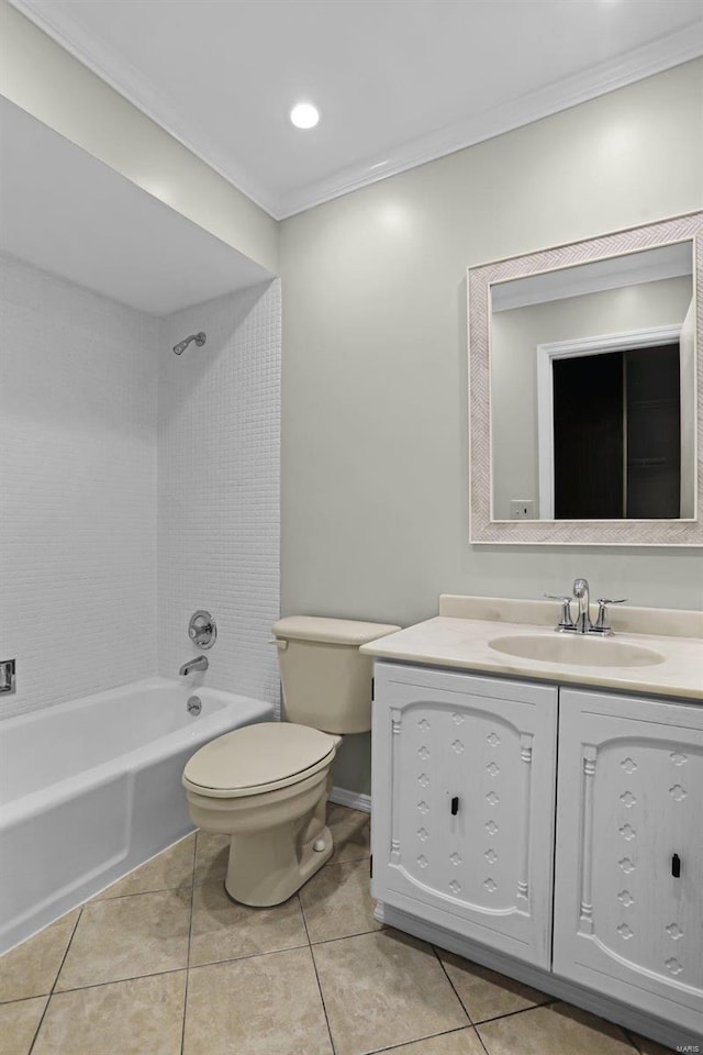 full bathroom with tile patterned floors, toilet, crown molding, and tiled shower / bath