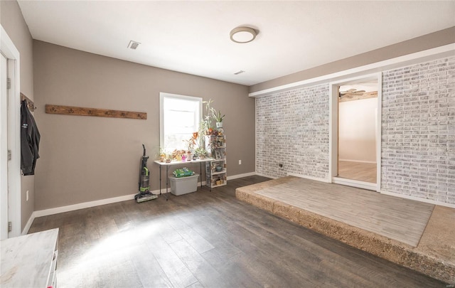 interior space with dark hardwood / wood-style flooring