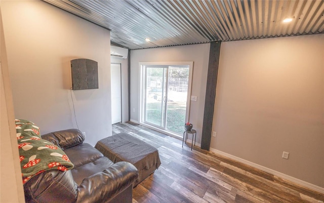 living room featuring dark wood-type flooring