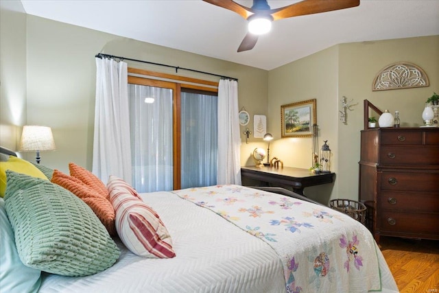 bedroom featuring ceiling fan and hardwood / wood-style flooring