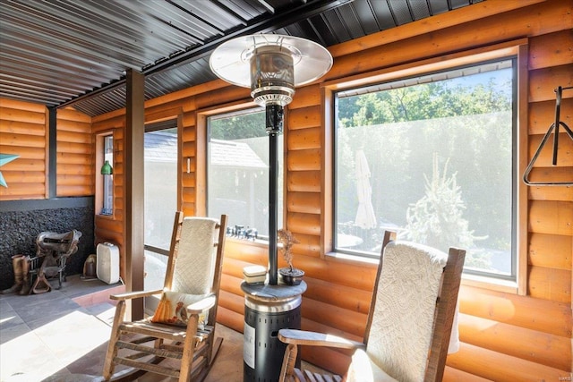 sunroom featuring a wealth of natural light