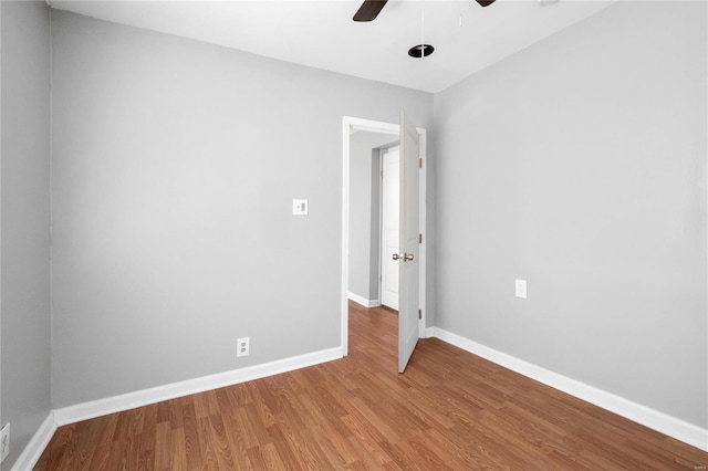 unfurnished room featuring wood-type flooring and ceiling fan