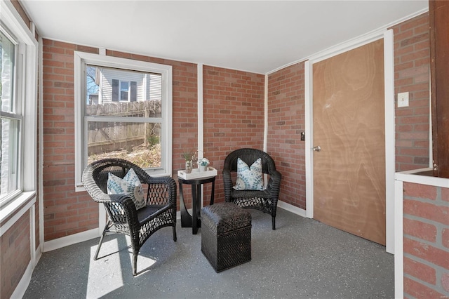 sunroom featuring a wealth of natural light