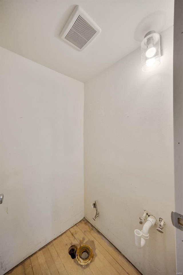 unfurnished room featuring hardwood / wood-style floors