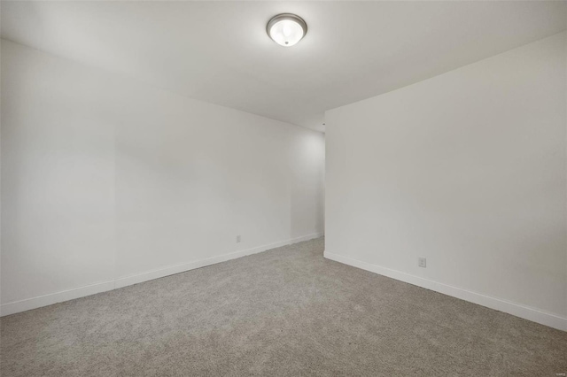 unfurnished room featuring carpet floors