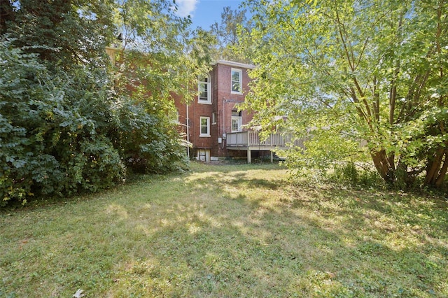 view of yard with a deck