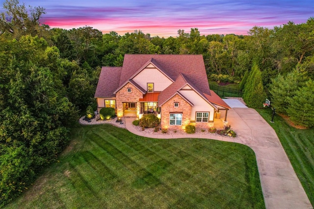 view of front of home featuring a yard