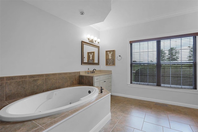 bathroom with crown molding, tile patterned flooring, vanity, and a relaxing tiled tub