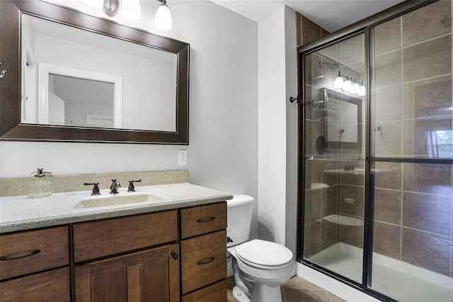 bathroom with walk in shower, vanity, and toilet