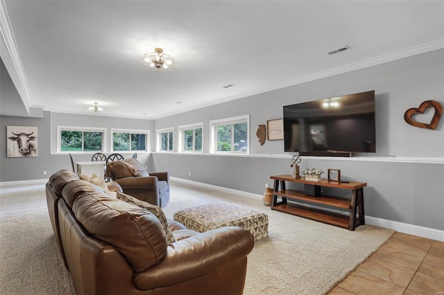 living room featuring ornamental molding and light tile patterned flooring