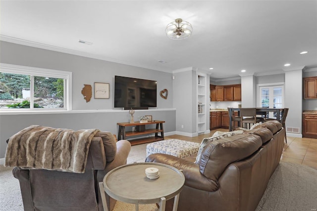 living room featuring light tile patterned floors and ornamental molding