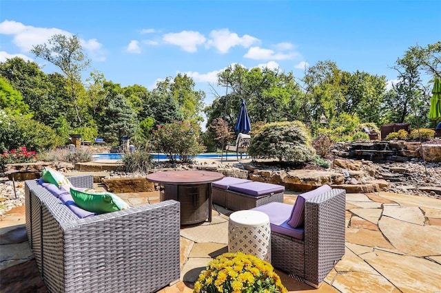 view of patio / terrace with a pool