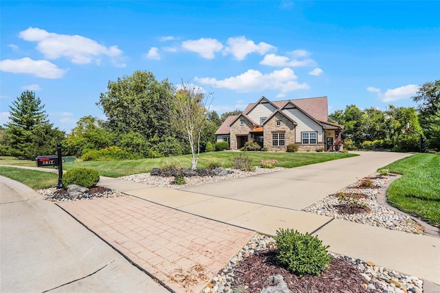 view of front of home with a front lawn