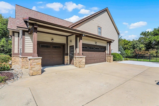 view of property exterior with a garage