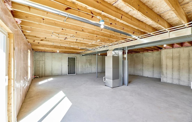 basement featuring heating unit