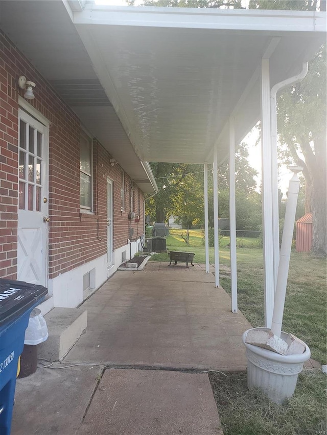 view of patio with central AC unit