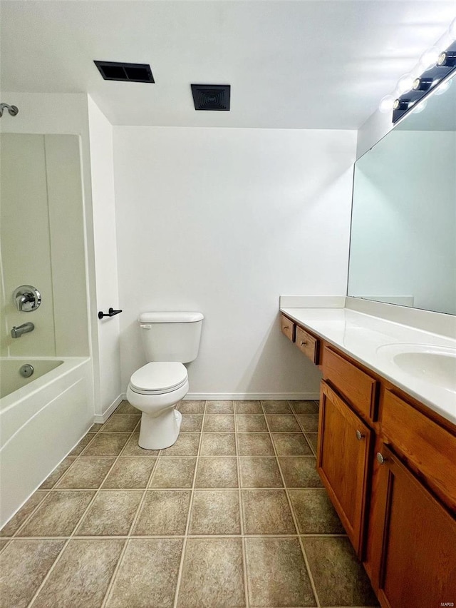 full bathroom featuring tile patterned floors, shower / washtub combination, vanity, and toilet