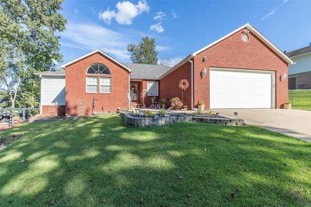 view of front of home featuring a garage and a front lawn